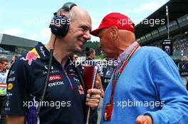 (L to R): Christian Horner (GBR) Red Bull Racing Team Principal with Niki Lauda (AUT) Mercedes Non-Executive Chairman on the grid. 22.06.2014. Formula 1 World Championship, Rd 8, Austrian Grand Prix, Spielberg, Austria, Race Day.