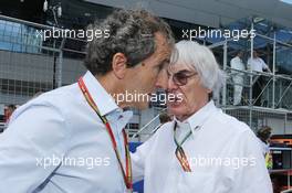(L to R): Alain Prost (FRA) on the grid with Bernie Ecclestone (GBR). 22.06.2014. Formula 1 World Championship, Rd 8, Austrian Grand Prix, Spielberg, Austria, Race Day.