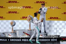 Nico Rosberg (GER), Mercedes AMG F1 Team and Valtteri Bottas (FIN), Williams F1 Team  22.06.2014. Formula 1 World Championship, Rd 8, Austrian Grand Prix, Spielberg, Austria, Race Day.