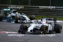 Valtteri Bottas (FIN) Williams FW36 leads Lewis Hamilton (GBR) Mercedes AMG F1 W05. 22.06.2014. Formula 1 World Championship, Rd 8, Austrian Grand Prix, Spielberg, Austria, Race Day.