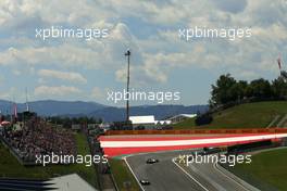 Valtteri Bottas (FIN), Williams F1 Team and Nico Rosberg (GER), Mercedes AMG F1 Team  22.06.2014. Formula 1 World Championship, Rd 8, Austrian Grand Prix, Spielberg, Austria, Race Day.