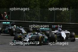 Nico Rosberg (GER) Mercedes AMG F1 W05 and Valtteri Bottas (FIN) Williams FW36. 22.06.2014. Formula 1 World Championship, Rd 8, Austrian Grand Prix, Spielberg, Austria, Race Day.