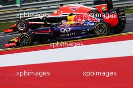 Daniel Ricciardo (AUS) Red Bull Racing RB10 and Jules Bianchi (FRA) Marussia F1 Team MR03. 22.06.2014. Formula 1 World Championship, Rd 8, Austrian Grand Prix, Spielberg, Austria, Race Day.