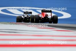 Kevin Magnussen (DEN), McLaren F1 and Jules Bianchi (FRA), Marussia F1 Team   21.06.2014. Formula 1 World Championship, Rd 8, Austrian Grand Prix, Spielberg, Austria, Qualifying Day.