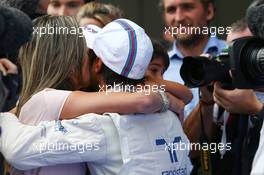 Felipe Massa (BRA) Williams with his son Felipinho Massa (BRA), wife Rafaela Bassi (BRA). 21.06.2014. Formula 1 World Championship, Rd 8, Austrian Grand Prix, Spielberg, Austria, Qualifying Day.