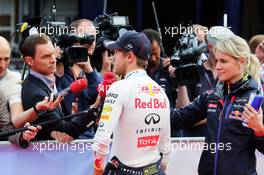Sebastian Vettel (GER) Red Bull Racing with the media. 21.06.2014. Formula 1 World Championship, Rd 8, Austrian Grand Prix, Spielberg, Austria, Qualifying Day.