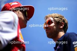 Sebastian Vettel (GER), Red Bull Racing and Kimi Raikkonen (FIN), Scuderia Ferrari  22.06.2014. Formula 1 World Championship, Rd 8, Austrian Grand Prix, Spielberg, Austria, Race Day.