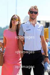 Jenson Button (GBR) McLaren with his girlfriend Jessica Michibata (JPN). 22.06.2014. Formula 1 World Championship, Rd 8, Austrian Grand Prix, Spielberg, Austria, Race Day.