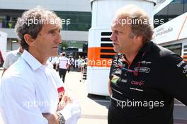 (L to R): Alain Prost (FRA) with Robert Fernley (GBR) Sahara Force India F1 Team Deputy Team Principal. 22.06.2014. Formula 1 World Championship, Rd 8, Austrian Grand Prix, Spielberg, Austria, Race Day.