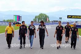 Daniil Kvyat (RUS) Scuderia Toro Rosso walks the circuit. 19.06.2014. Formula 1 World Championship, Rd 8, Austrian Grand Prix, Spielberg, Austria, Preparation Day.