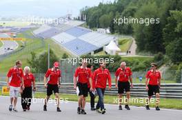 The Marussia F1 Team walk the circuit. 19.06.2014. Formula 1 World Championship, Rd 8, Austrian Grand Prix, Spielberg, Austria, Preparation Day.