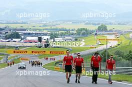 Jules Bianchi (FRA) Marussia F1 Team walks the circuit. 19.06.2014. Formula 1 World Championship, Rd 8, Austrian Grand Prix, Spielberg, Austria, Preparation Day.