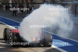 Fernando Alonso (ESP) Ferrari F14-T running sensor equipment and with smoke pouring from the car. 19.02.2014. Formula One Testing, Bahrain Test One, Day One, Sakhir, Bahrain.