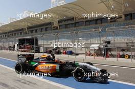 Nico Hulkenberg (GER) Sahara Force India F1 VJM07 leaves the pits. 20.02.2014. Formula One Testing, Bahrain Test One, Day Two, Sakhir, Bahrain.