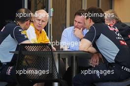 Christian Horner (GBR) Red Bull Racing Team Principal in a meeting with Jean-Michel Jalinier (FRA) Renault F1 Sport President and Managing Director, Dr Helmut Marko (AUT) Red Bull Motorsport Consultant (Far right) and other members of the Red Bull Racing team. 19.02.2014. Formula One Testing, Bahrain Test One, Day One, Sakhir, Bahrain.