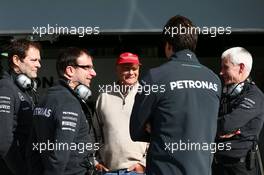 (L to R): Aldo Costa (ITA) Mercedes AMG F1 Engineering Director with Niki Lauda (AUT) Mercedes Non-Executive Chairman; Toto Wolff (GER) Mercedes AMG F1 Shareholder and Executive Director and Geoff Willis (GBR) Mercedes AMG F1 Technology Director. 19.02.2014. Formula One Testing, Bahrain Test One, Day One, Sakhir, Bahrain.