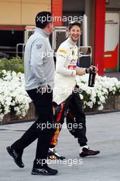 (L to R): Eric Boullier (FRA) McLaren Racing Director with Romain Grosjean (FRA) Lotus F1 Team. 20.02.2014. Formula One Testing, Bahrain Test One, Day Two, Sakhir, Bahrain.