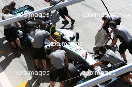 Lewis Hamilton (GBR) Mercedes AMG F1 W05 in the pits. 21.02.2014. Formula One Testing, Bahrain Test One, Day Three, Sakhir, Bahrain.