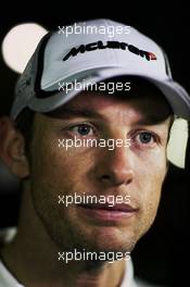 Jenson Button (GBR) McLaren with the media. 28.02.2014. Formula One Testing, Bahrain Test Two, Day Two, Sakhir, Bahrain.