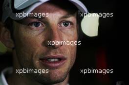 Jenson Button (GBR) McLaren with the media. 28.02.2014. Formula One Testing, Bahrain Test Two, Day Two, Sakhir, Bahrain.