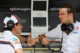 Adrian Sutil (GER), Sauber F1 Team and Giedo van der Garde (NDL), third driver, Sauber F1 Team   28.02.2014. Formula One Testing, Bahrain Test Two, Day Two, Sakhir, Bahrain.