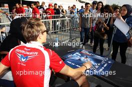 Max Chilton (GBR) Marussia F1 Team signs autographs for the fans. 28.02.2014. Formula One Testing, Bahrain Test Two, Day Two, Sakhir, Bahrain.