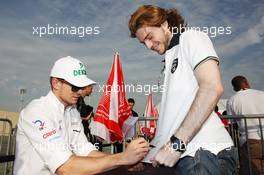 Nico Hulkenberg (GER) Sahara Force India F1 signs autographs for the fans. 28.02.2014. Formula One Testing, Bahrain Test Two, Day Two, Sakhir, Bahrain.