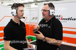 (L to R): Oliver Knighton (GBR) Sahara Force India F1 Team Race Support Engineer with Tom McCullough (GBR) Sahara Force India F1 Team Chief Engineer. 01.03.2014. Formula One Testing, Bahrain Test Two, Day Three, Sakhir, Bahrain.