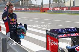 Sebastian Vettel (GER) Red Bull Racing RB10 stops at the pit lane exit. 01.03.2014. Formula One Testing, Bahrain Test Two, Day Three, Sakhir, Bahrain.