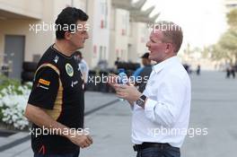 (L to R): Federico Gastaldi (ARG) Lotus F1 Team Business Development Director with Andrew Ruhan (GBR) Lotus F1 Team Co-Chairman, Investor and Board Member. 27.02.2014. Formula One Testing, Bahrain Test Two, Day One, Sakhir, Bahrain.
