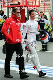 (L to R): Graeme Lowdon (GBR) Marussia F1 Team Chief Executive Officer with Alexander Rossi (USA) Marussia F1 Team. 22.08.2014. Formula 1 World Championship, Rd 12, Belgian Grand Prix, Spa Francorchamps, Belgium, Practice Day.