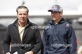 Max Verstappen (NLD) Scuderia Toro Rosso with Raymond Vermeulen (NLD) Driver Manager. 22.08.2014. Formula 1 World Championship, Rd 12, Belgian Grand Prix, Spa Francorchamps, Belgium, Practice Day.