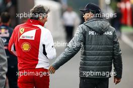 (L to R): Marco Mattiacci (ITA) Ferrari Team Principal with Lewis Hamilton (GBR) Mercedes AMG F1. 22.08.2014. Formula 1 World Championship, Rd 12, Belgian Grand Prix, Spa Francorchamps, Belgium, Practice Day.