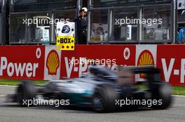 Nico Rosberg (GER) Mercedes AMG F1 W05 passes a pit box board. 22.08.2014. Formula 1 World Championship, Rd 12, Belgian Grand Prix, Spa Francorchamps, Belgium, Practice Day.