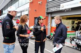 (L to R): Nico Hulkenberg (GER) Sahara Force India F1 with Natalie Pinkham (GBR) Sky Sports Presenter; Sergio Perez (MEX) Sahara Force India F1 and Simon Lazenby (GBR) Sky Sports F1 TV Presenter. 22.08.2014. Formula 1 World Championship, Rd 12, Belgian Grand Prix, Spa Francorchamps, Belgium, Practice Day.
