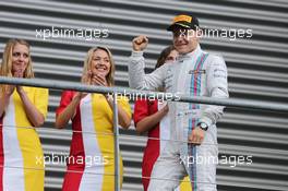 Valtteri Bottas (FIN) Williams celebrates his third position on the podium. 24.08.2014. Formula 1 World Championship, Rd 12, Belgian Grand Prix, Spa Francorchamps, Belgium, Race Day.
