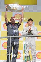 Adrian Newey (GBR) Red Bull Racing Chief Technical Officer celebrates on the podium. 24.08.2014. Formula 1 World Championship, Rd 12, Belgian Grand Prix, Spa Francorchamps, Belgium, Race Day.