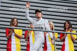 Nico Rosberg (GER) Mercedes AMG F1 celebrates his second position on the podium. 24.08.2014. Formula 1 World Championship, Rd 12, Belgian Grand Prix, Spa Francorchamps, Belgium, Race Day.