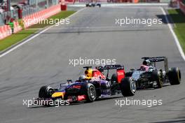 Sebastian Vettel (GER), Red Bull Racing and Jenson Button (GBR), McLaren F1 Team  24.08.2014. Formula 1 World Championship, Rd 12, Belgian Grand Prix, Spa Francorchamps, Belgium, Race Day.