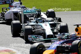 Nico Rosberg (GER), Mercedes AMG F1 Team and Valtteri Bottas (FIN), Williams F1 Team  24.08.2014. Formula 1 World Championship, Rd 12, Belgian Grand Prix, Spa Francorchamps, Belgium, Race Day.