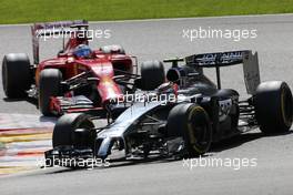 Kevin Magnussen (DEN), McLaren F1 and Fernando Alonso (ESP), Scuderia Ferrari  24.08.2014. Formula 1 World Championship, Rd 12, Belgian Grand Prix, Spa Francorchamps, Belgium, Race Day.