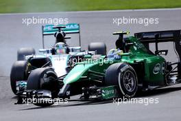 Marcus Ericsson (SWE), Caterham F1 Team and Lewis Hamilton (GBR), Mercedes AMG F1 Team  24.08.2014. Formula 1 World Championship, Rd 12, Belgian Grand Prix, Spa Francorchamps, Belgium, Race Day.