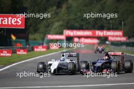 Felipe Massa (BRA) Williams FW36 and Daniil Kvyat (RUS) Scuderia Toro Rosso STR9 battle for position. 24.08.2014. Formula 1 World Championship, Rd 12, Belgian Grand Prix, Spa Francorchamps, Belgium, Race Day.