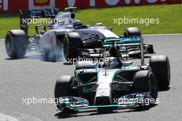 Nico Rosberg (GER), Mercedes AMG F1 Team and Valtteri Bottas (FIN), Williams F1 Team  24.08.2014. Formula 1 World Championship, Rd 12, Belgian Grand Prix, Spa Francorchamps, Belgium, Race Day.