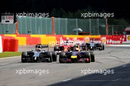 Kevin Magnussen (DEN), McLaren F1 and Sebastian Vettel (GER), Red Bull Racing  24.08.2014. Formula 1 World Championship, Rd 12, Belgian Grand Prix, Spa Francorchamps, Belgium, Race Day.