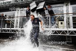 Adrian Newey (GBR) Red Bull Racing Chief Technical Officer and Christian Horner (GBR) Red Bull Racing Team Principal take part in the ALS ice bucket challenge. 23.08.2014. Formula 1 World Championship, Rd 12, Belgian Grand Prix, Spa Francorchamps, Belgium, Qualifying Day.