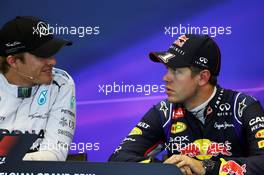 (L to R): Nico Rosberg (GER) Mercedes AMG F1 and Sebastian Vettel (GER) Red Bull Racing in the FIA Press Conference. 23.08.2014. Formula 1 World Championship, Rd 12, Belgian Grand Prix, Spa Francorchamps, Belgium, Qualifying Day.