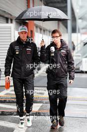 Nico Hulkenberg (GER) Sahara Force India F1 with Will Hings (GBR) Sahara Force India F1 Press Officer. 23.08.2014. Formula 1 World Championship, Rd 12, Belgian Grand Prix, Spa Francorchamps, Belgium, Qualifying Day.