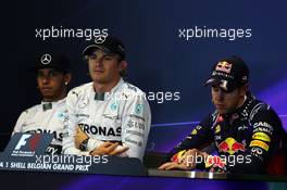 The post qualifying FIA Press Conference (L to R): Lewis Hamilton (GBR) Mercedes AMG F1, second; Nico Rosberg (GER) Mercedes AMG F1, pole position; Sebastian Vettel (GER) Red Bull Racing, third. 23.08.2014. Formula 1 World Championship, Rd 12, Belgian Grand Prix, Spa Francorchamps, Belgium, Qualifying Day.