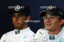 Pole sitter Nico Rosberg (GER) Mercedes AMG F1 (Right) and team mate Lewis Hamilton (GBR) Mercedes AMG F1 in the qualifying FIA Press Conference. 23.08.2014. Formula 1 World Championship, Rd 12, Belgian Grand Prix, Spa Francorchamps, Belgium, Qualifying Day.